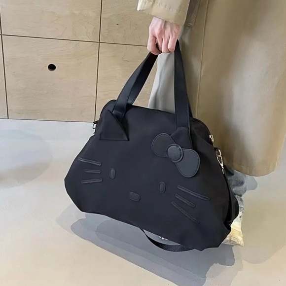 Hello Kitty Black Tote with Bow Accent duffle crossbody bag removable strap - Picture 8 of 16